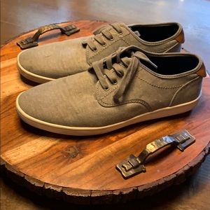 Men’s grey canvas shoes.